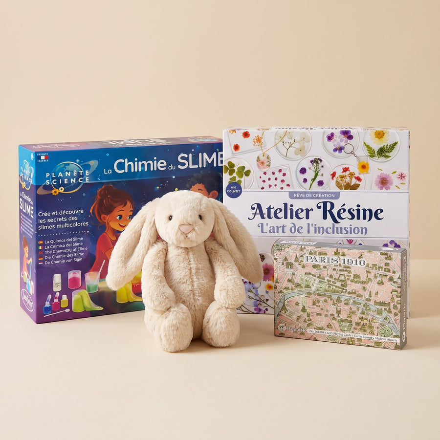 Idées de cadeaux pour une fille de 11 ans : atelier résine l'art de l'inclusion, kit La Chimie du slime, lapin duveteux Oat et jeux de cartes Paris 1910