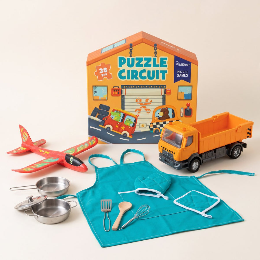 Idées de cadeaux pour un garçon de 3 ans : avion en bois, camion benne, set de cuisine avec tablier et puzzle circuit