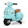 Porteur électrique Mini Vespa GTS vert d'eau avec selle marron, phare rond et petites roulettes, vue de trois quarts
